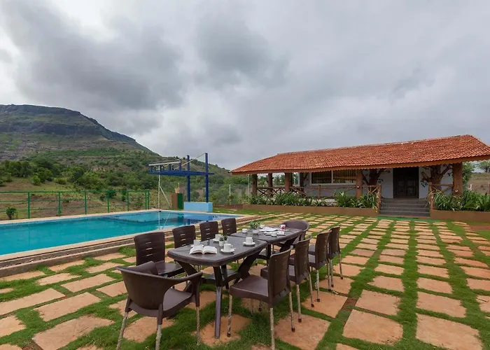 Stayvista's Ficus Farms: Mountain-View Retreat with Rustic Charm & Entertainment Igatpuri