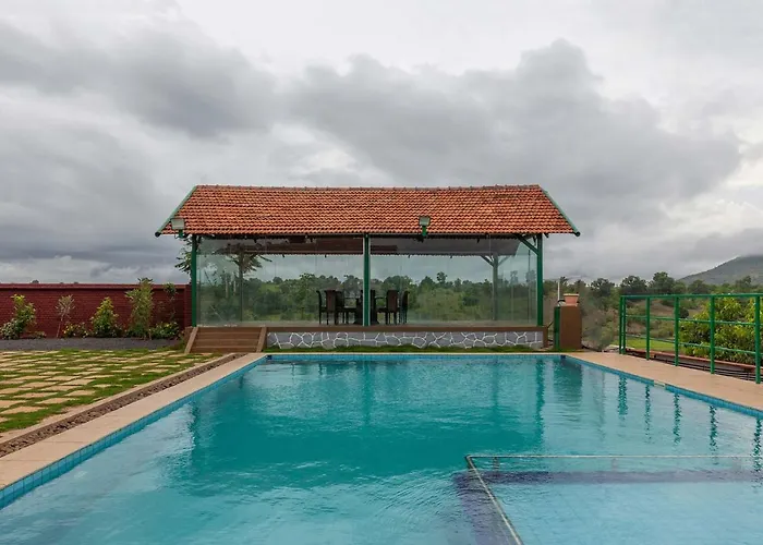 Stayvista's Ficus Farms: Mountain-View Retreat with Rustic Charm & Entertainment Igatpuri